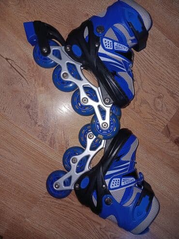 male skije za odrasle: Roleri 29-33– plavo/crne - Kočnica: zadnja kočnica na desnoj rolerci — 1