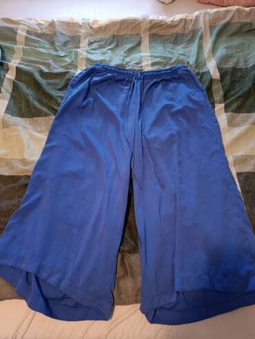 Haljine: Plave široke pantalone/bermude do listova - Materijal: lagana, glatka — 1