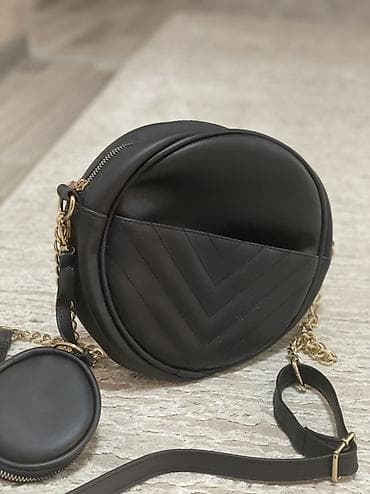 providna torba: Okrugla crna torba preko ramena sa dodatnom mini torbicom - Dizajn — 1