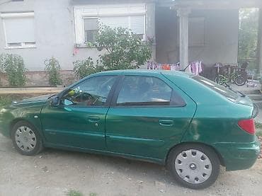 tapacir golf 4: Citroën Xsara – hečbek, zelena boja, 5 vrata. - Motor: benzinski — 5