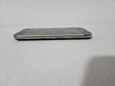 pixi 4: Na prodaju Samsung Galaxy S5 mini u crnoj boji. Telefon je fizički — 5
