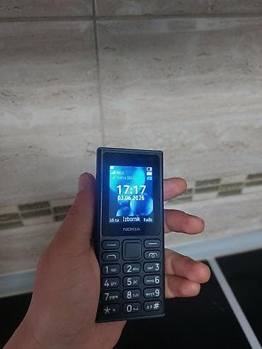 s link slusalice: Nokia klasični mobilni telefon sa fizičkom tastaturom Karakteristike — 1