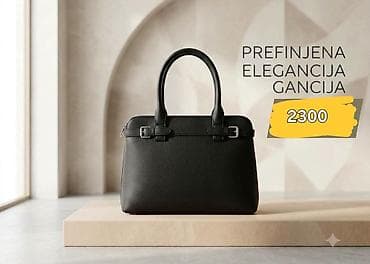 Elegantna crna ženska torba. - Klasičan trapezoidni dizajn sa na lalafo.rs Elegantna crna ženska torba. - Klasičan trapezoidni dizajn sa