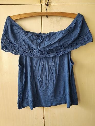 uvijac za kosu trostruki: Plava ženska majica bez rukava, sa širokim spuštenim okovratnikom na — 1