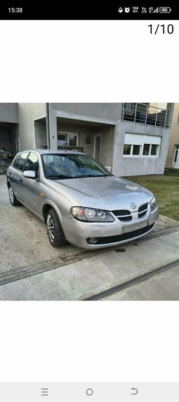 Nissan Almera: 1.5 l | 2006 г. Hečbek