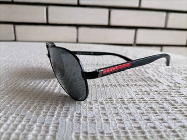 top coat: Sunglasses, Prada — 2