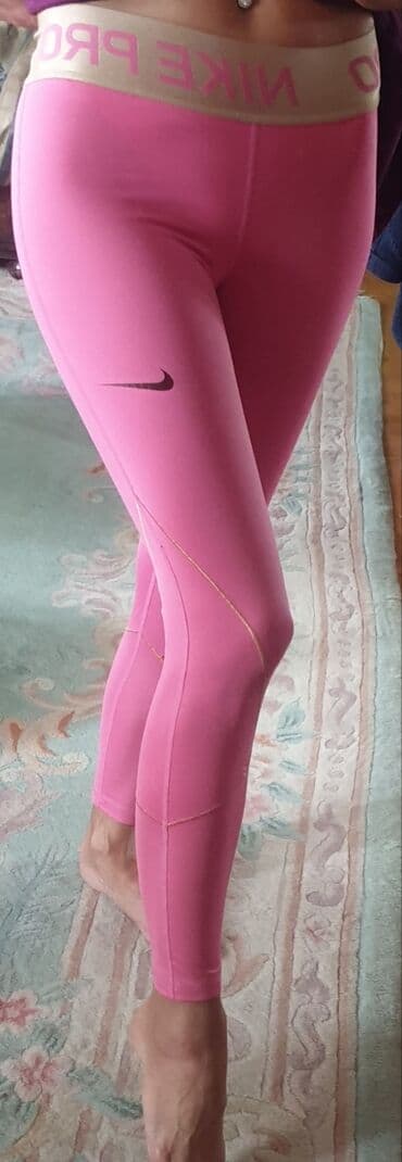 nike farmerke: NIKE pro dri fit original helanke roze boje sa zlatnom debelom gumom — 9