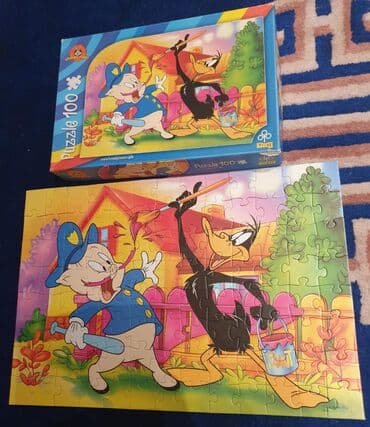 bruder igracke srbija: ﻿Looney tunes Trefl puzzle- puzle. 100 komada.  Lovac i patak Daca — 2