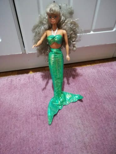 dinosaurusi igracke: Prelepa Barby sirena
kao nova — 2