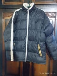 pantalone za punije osobe: Zimska puffer jakna, muški/unisex model. nošeno ima pocepano vidi se — 4