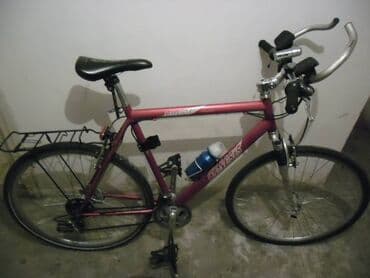 gitara za decu cena: Bicikl gradski Genesis 21 brzina,28 cola,pr.amortizer,amortizer — 1