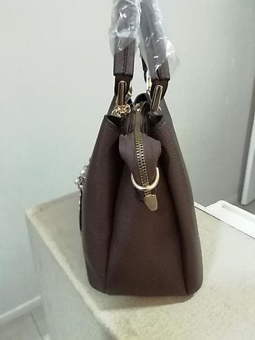new yorker torbe za plazu: Prelepa braon nova tašna. Izuzetna izrada oko ručki. Dužina 28 cm i — 5