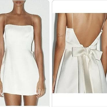 odece: Kratka satenska haljina na bretele – boja šampanj/ivori. - Model — 1