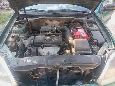 tapacir golf 4: Citroën Xsara – hečbek, zelena boja, 5 vrata. - Motor: benzinski — 1