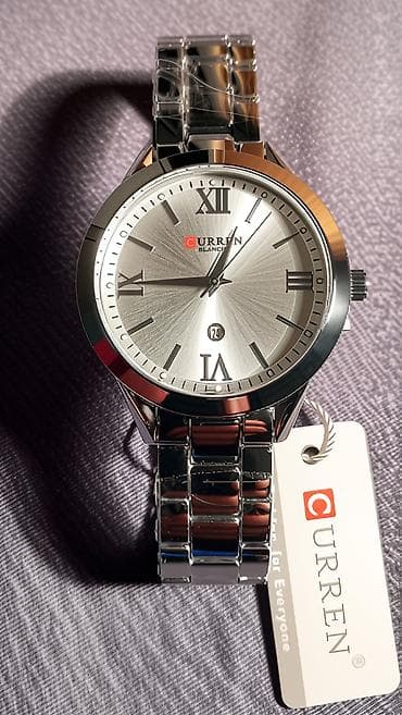 binatone sat nav: Nov ženski sat od nerdjajućeg čelika. Kvarcni mehanizam, ima datum — 9