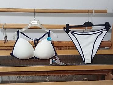 Nov, elegantan, dvodelni kupaći kostim NEW YORKER, beli sa teget na lalafo.rs Nov, elegantan, dvodelni kupaći kostim NEW YORKER, beli sa teget