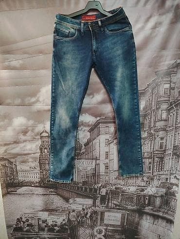 Muške farmerke u plavom denimu sa efektnim izbledelim detaljima na na lalafo.rs Muške farmerke u plavom denimu sa efektnim izbledelim detaljima na