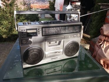 Headphones: Universum ctr 2304u. -radio ispravno. -dek premotava levo i desno — 2