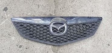 popravka auto sedista: MASKA ZA MAZDA 2 | Polovni originalni delovi Mazda Prednji — 1