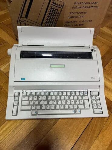 cena srpski dukat: *** SUPER AKCIJA *** #2782 Elektronska pisaća mašina Optima SP 24; — 4