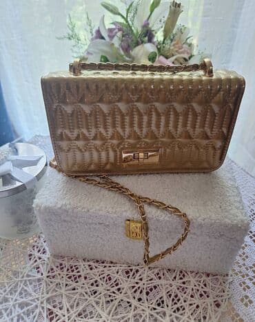 Donji delovi trenerke: Elegantna torbica — 1