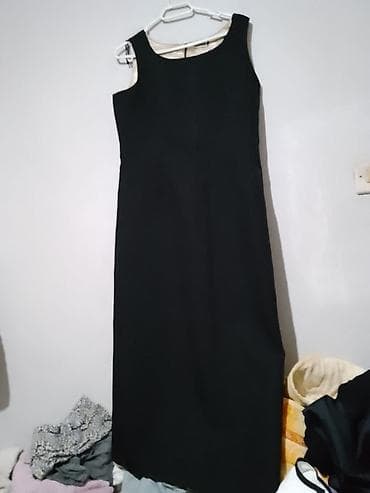 Crna elegantna haljina bez rukava - Klasičan, ravan kroj do ispod na lalafo.rs Crna elegantna haljina bez rukava - Klasičan, ravan kroj do ispod