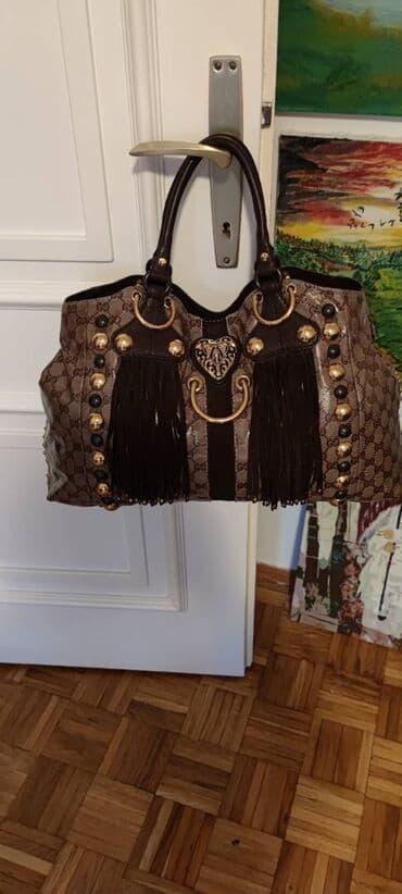 Ostali aksesoari: Gucci. Fantastična.

Bez ikakvih nedostataka.
45cm x 28cm x 10cm — 9