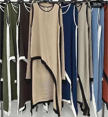 Kompleti: Komplet široke pantalone i asimetrična tunika u pero. - Kroj ležeran — 6