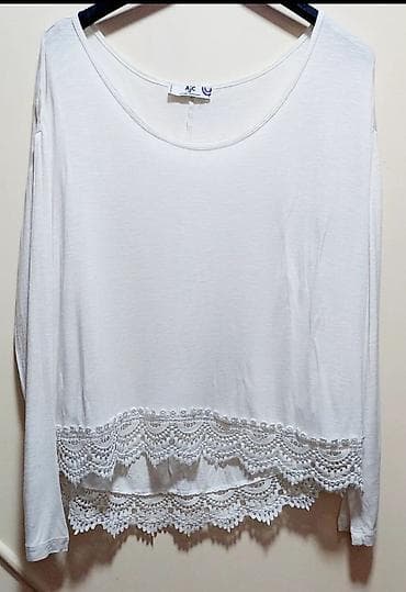 Bela ženska bluza dugih rukava sa dekorativnom čipkom na donjem na lalafo.rs Bela ženska bluza dugih rukava sa dekorativnom čipkom na donjem