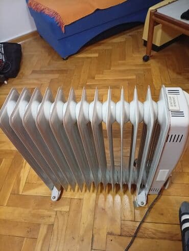 Donji delovi trenerke: Ulje­ni radijator na točkićima - Tip: električni uljni radijator sa — 4