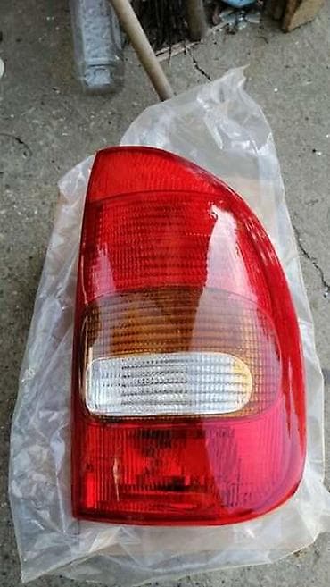 neodimijum magneti cena: DESNA STOP LAMPA(5 VRATA) ZA OPEL CORSA B OD 1991. DO 2000. GOD. | — 1