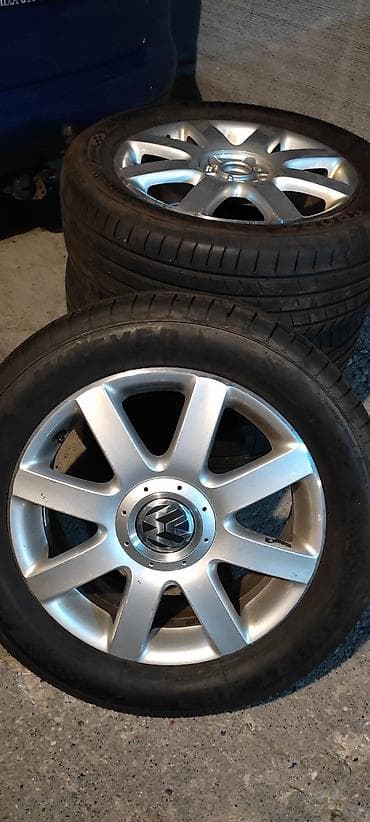 osovina auto: Komplet od 4 aluminijumske felne sa gumama za Volkswagen. - Model — 3