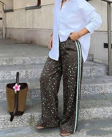 Pantalone: 🔥Ženske široke pantalone sa animal printom i bočnim prugama
✅2400 din — 4