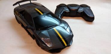 dzipovi na akumulator: Lamborghini na daljinski,2,4 GHz. razmera tj. 20 cm.u auto 3 x 1, 5 — 1