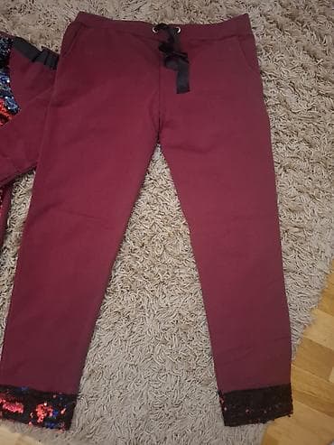 Donji delovi trenerke: Kompletna ženska trenerka koja se sastoji od gornjeg dela i donjeg — 2