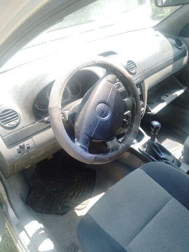 Teretna i poljoprivredna vozila: Chevrolet Nubira karavan – srebrna boja - Karoserija: karavan (5 — 5