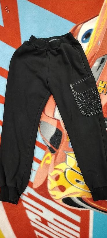 ipanema crne sandale: Dečije trenerka pantalone – crne - Model: jogger kroj sa ranflama na — 1