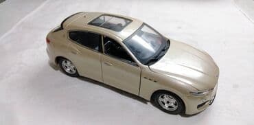 luj viton torbe original cene: Burago Maserati Levante, 1:24.Fale retrovizori tockovi nisu original — 1