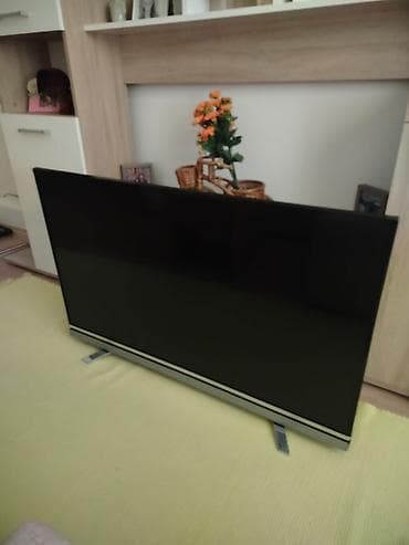 a neka slika: Televizor marke Grunding, 49 inča,ton ima ali sliku nema,smart tv — 1