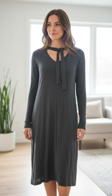 cizme novi pazar: Duga crna haljina sa dugim rukavima i vezivanjem oko vrata. Mekan — 1