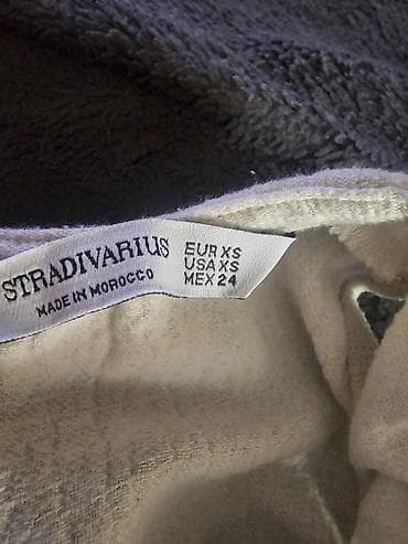 Haljine: Stradivarius haljina bez rukava, bež/ekru boje. Model sa izrezom u — 4