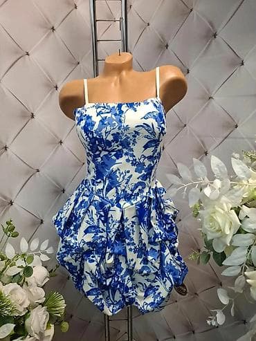 Haljine: Koktel haljina sa tankim bretelicama i skulpturalnom suknjom - Model — 8