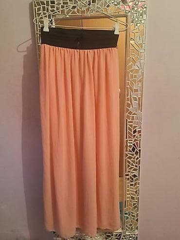 Duga roze suknja. Univerzalna vel, pa odgovara za S, M, pa i L