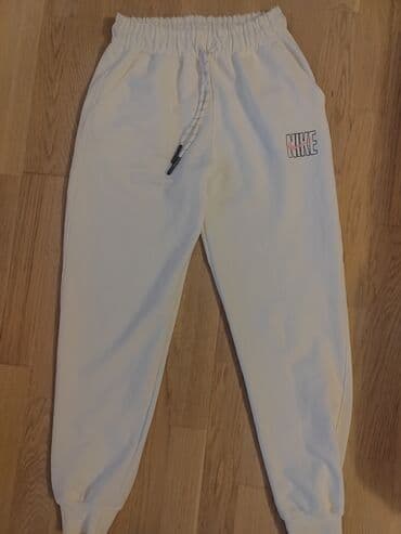 adidas bele zenske patike: Donji deo trenerke, M, Nike, bоја - Bela, Pamuk — 1