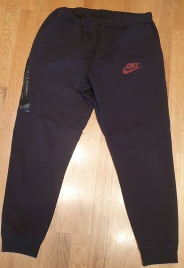 c a zimske jakne: NIKE muška trenerka, donji deo trenerke, crna. Ima dugački džep sa — 1