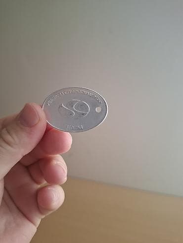 Metalni privezak/žeton “Studentski centar Beograd – 2024”. - Ovalni