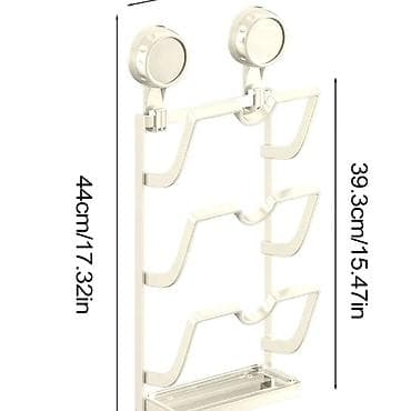 nelepljiva podloga za testo: 02. Držač za poklopce Cena: 2999 din Zidni držač za poklopce lonaca — 5