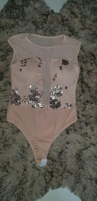 bonatti donji veš: Elegantan ženski bodi bez rukava u puder‑roze boji. Gornji deo je od — 1