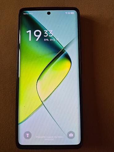 bufer za auto: Infinix Note 40 Pro,star manje od dve godine. Zelena pozadina od — 3