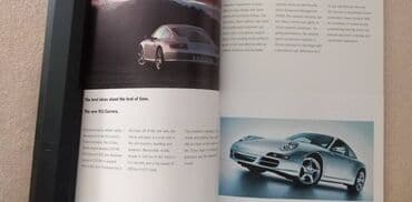 zagor stripovi: Prospekt Porsche The models 2004. 60 str.21x15,5 cm. eng. nov — 3